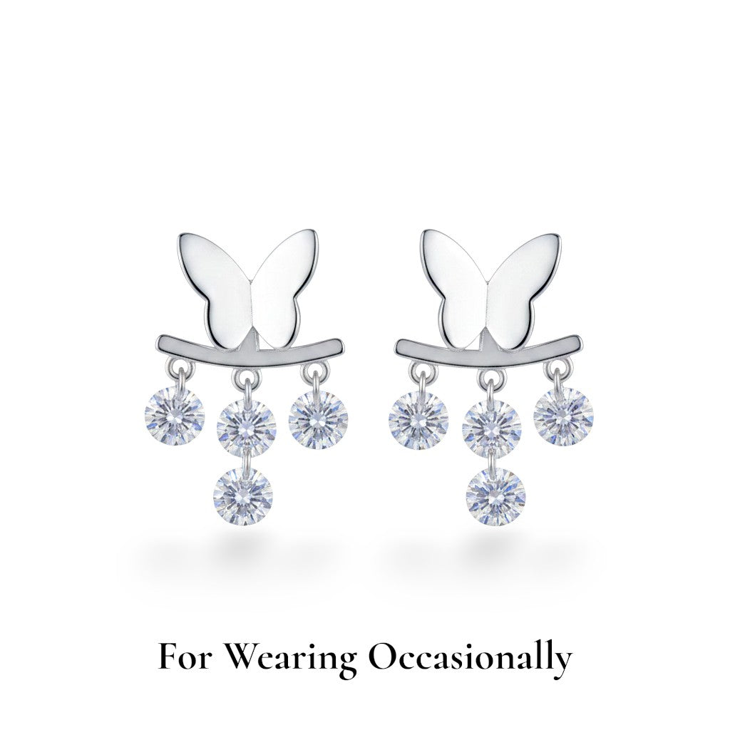 NAGPAL JEWELLERS Imperial Butterfly-Bar Chandelier Studs in 92.5 silver with dangling clear crystals.