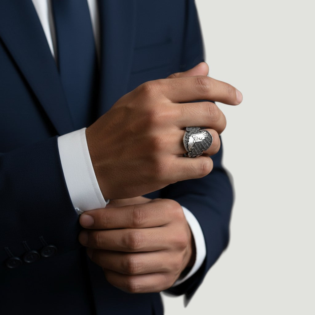 NAGPAL JEWELLERS The Eagle's Aegis Band, a silver ring with an eagle design and intricate detailing, size 19.