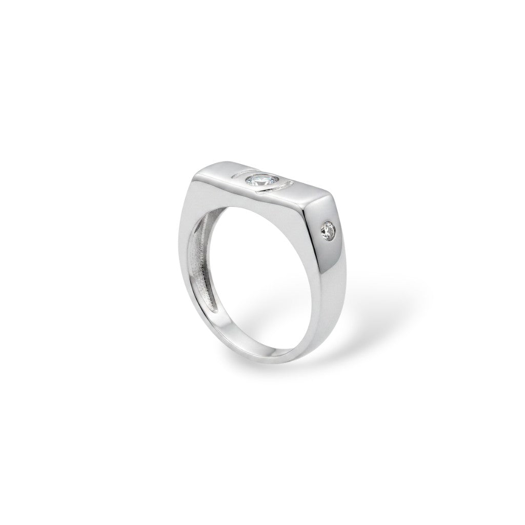 NAGPAL JEWELLERS The Essence Signet ring, silver with a central clear stone and two smaller stones on the side.