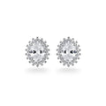NAGPAL JEWELLERS Ginko Glitz oval stud earrings with halo of small diamonds, crafted from 92.5 silver.