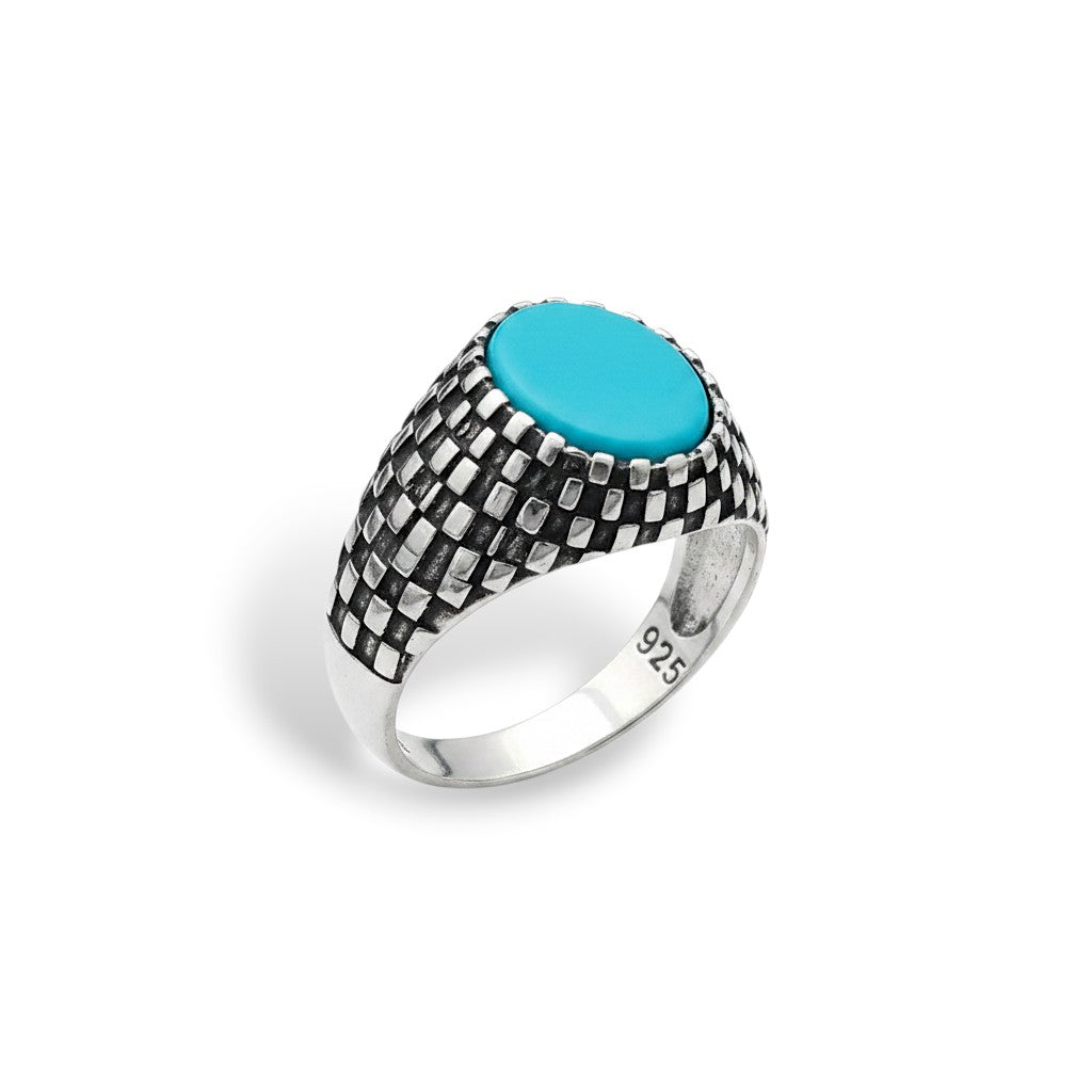 NAGPAL JEWELLERS The Gridiron Signet men's ring with a turquoise oval stone and textured silver band. Size 22.