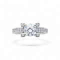 NAGPAL JEWELLERS Imperial Gala Ring with a large central diamond and smaller stones on the band, size 17.
