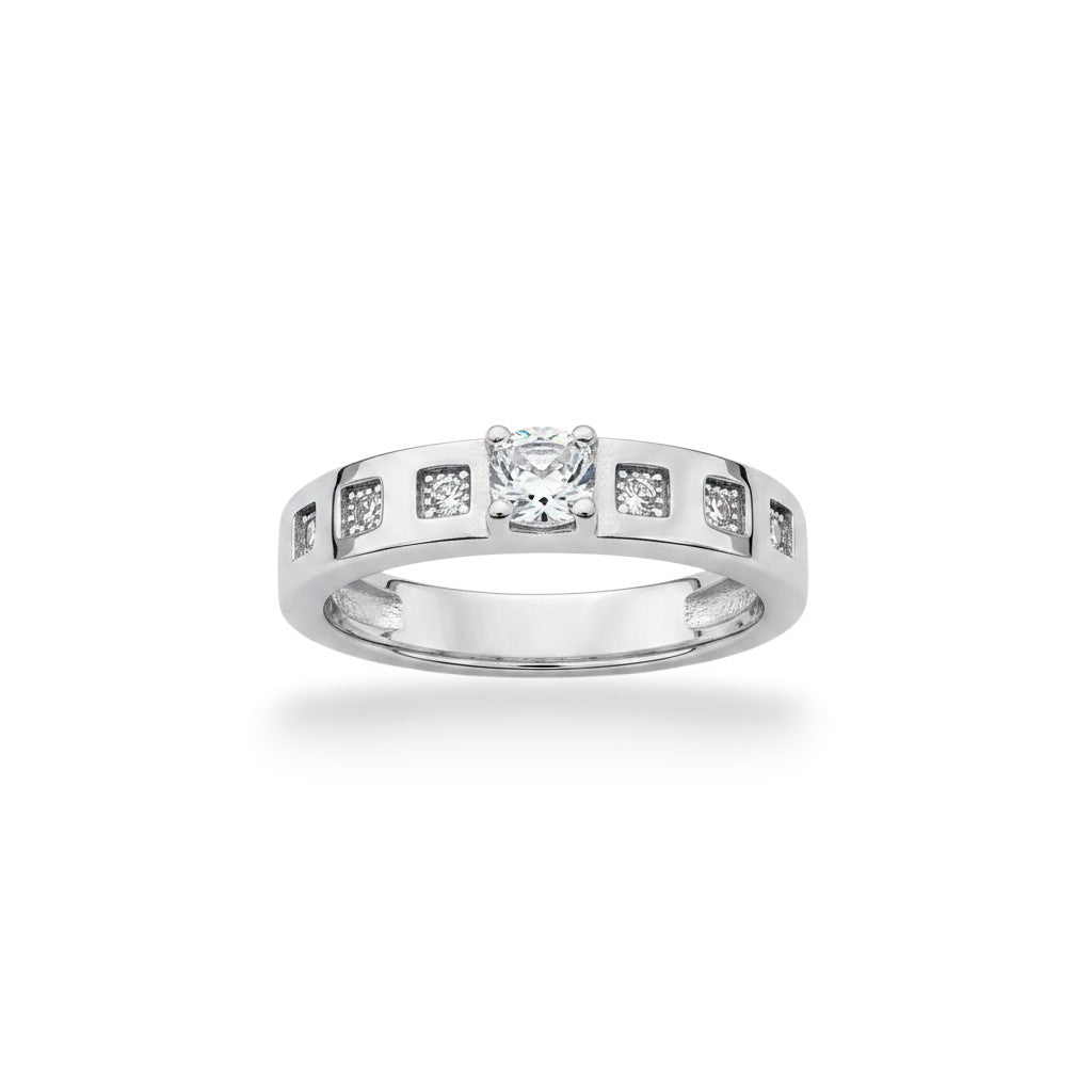 NAGPAL JEWELLERS The Lumina Sequence Band ring with a central diamond and smaller stones in a silver setting. Ring size 19.