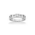 NAGPAL JEWELLERS The Lumina Sequence Band ring with a central diamond and smaller stones in a silver setting. Ring size 19.