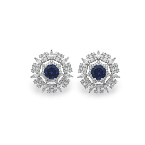 NAGPAL JEWELLERS Midnight Radiance Discs, 92.5 silver stud earrings with deep blue center stone and clear baguette and marquise cut stones.