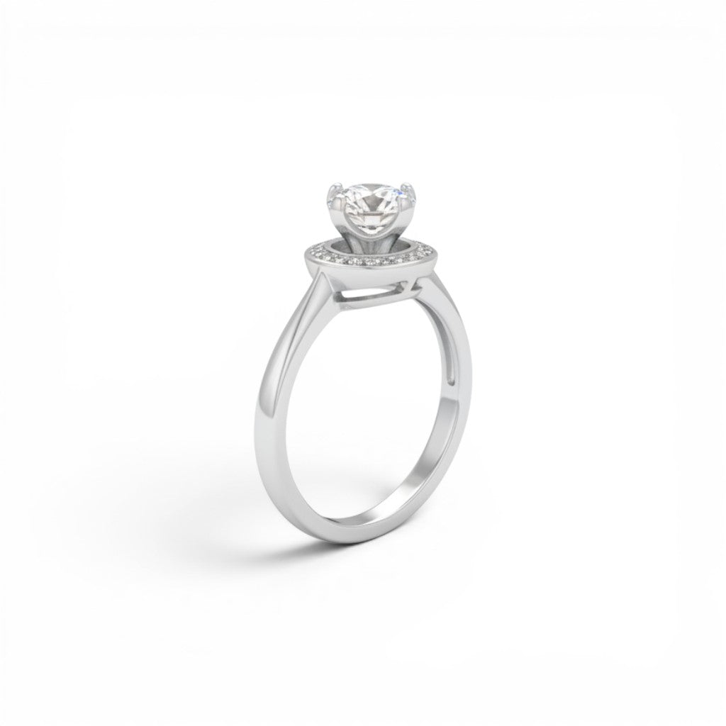 NAGPAL JEWELLERS The Orbit Rise ring, size 12, with a central round-cut diamond surrounded by a halo of smaller stones.