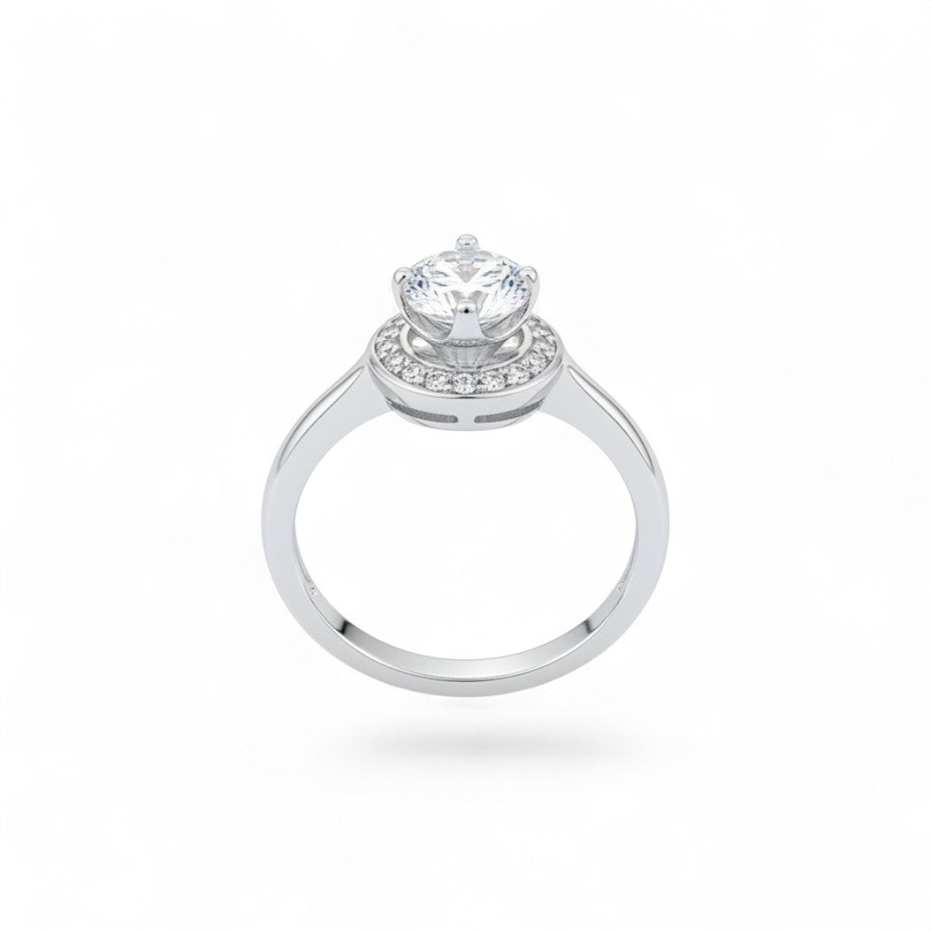 NAGPAL JEWELLERS The Orbit Rise ring, size 12, featuring a central round-cut cubic zirconia surrounded by a halo of smaller stones.