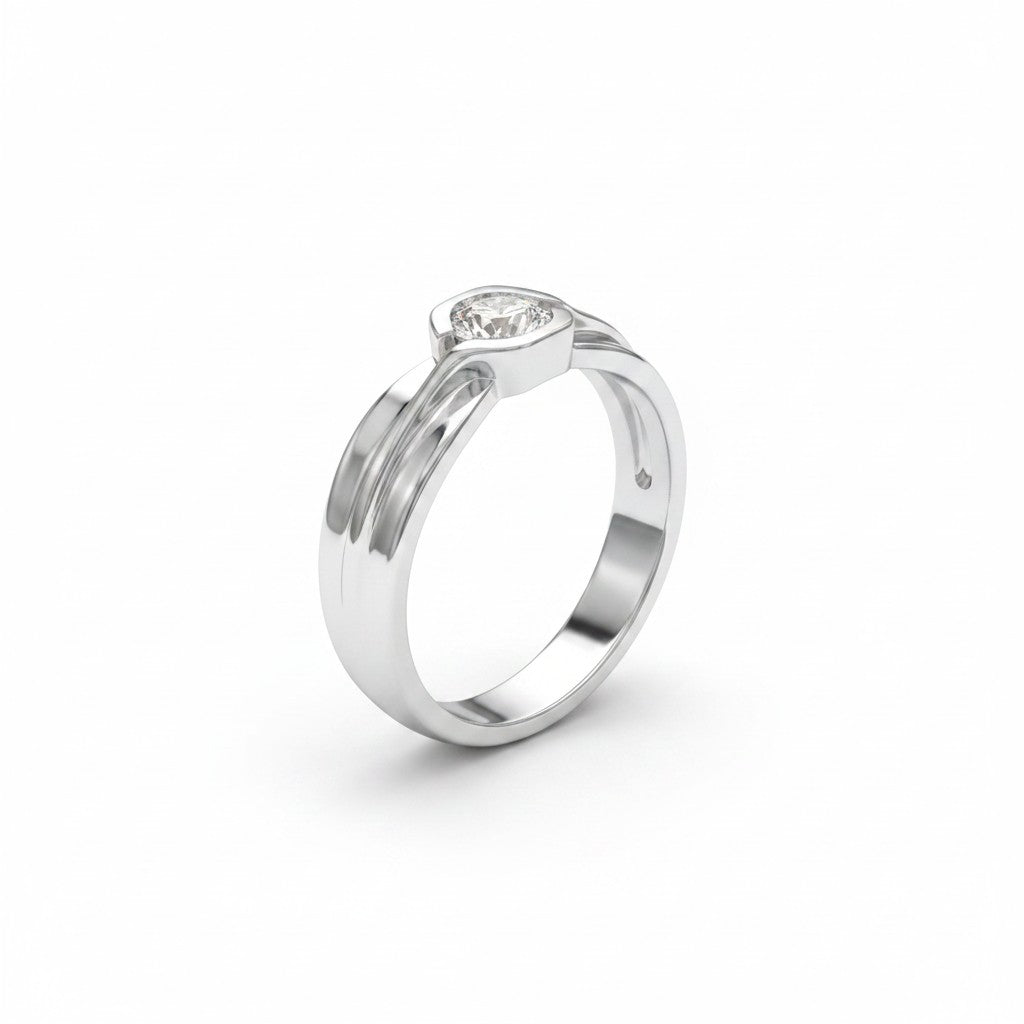 NAGPAL JEWELLERS The Sculpted Ring, a silver band with a single clear stone set in a bezel.