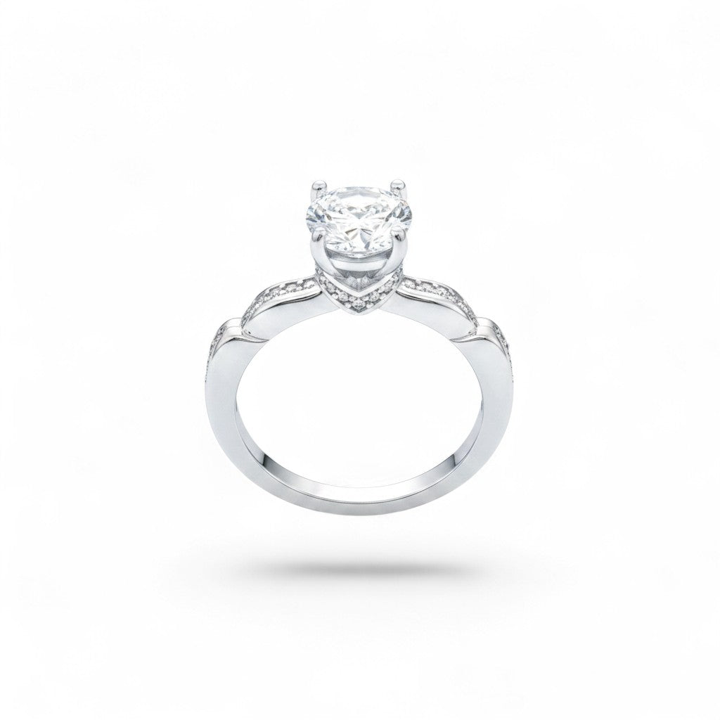 NAGPAL JEWELLERS Serpentine Sparkle ring with a large clear stone and small accent stones on a twisted band.