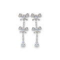 NAGPAL JEWELLERS Dual-Ton Love Studs, silver bow earrings with clear cubic zirconia teardrop pendant.