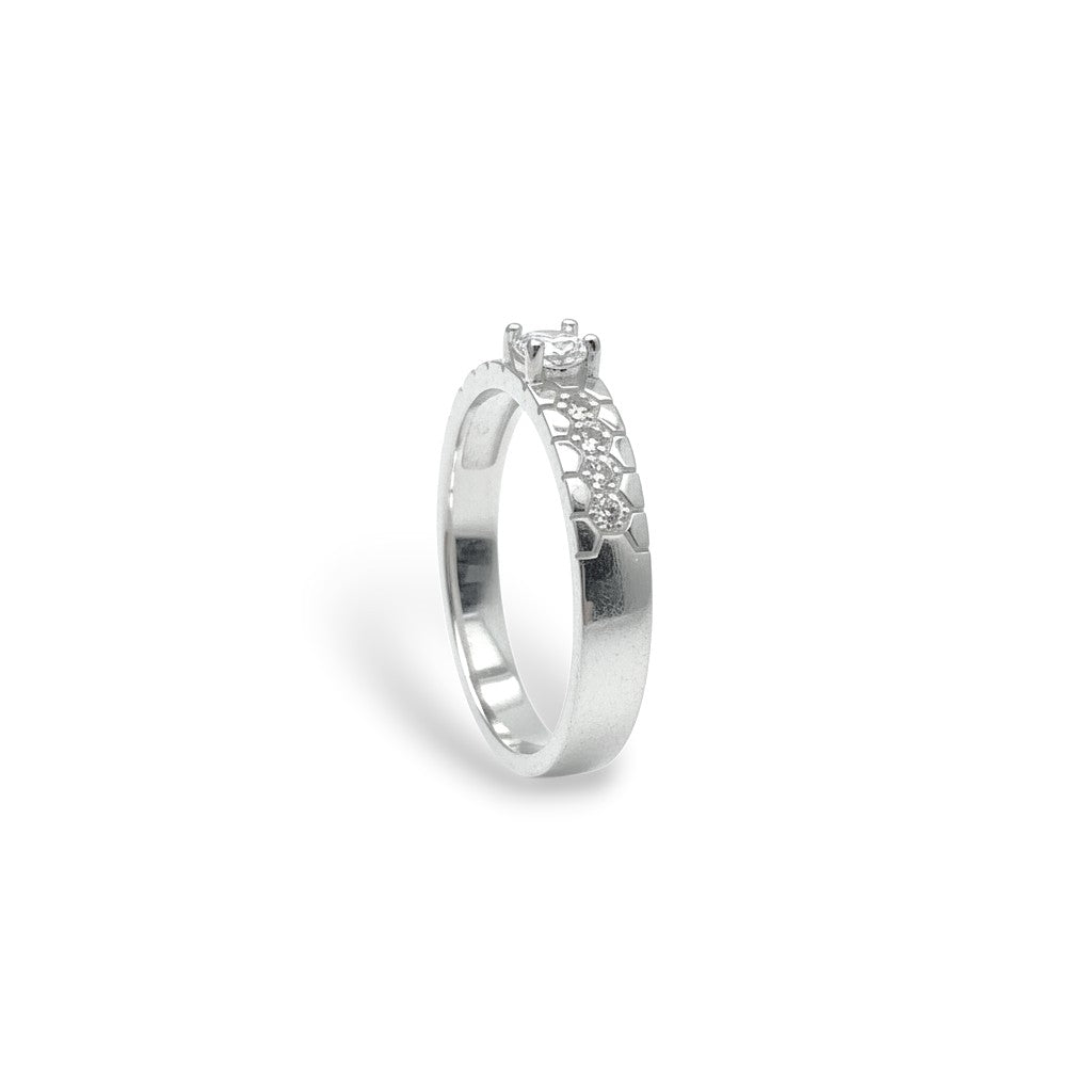 NAGPAL JEWELLERS silver ring with a central clear stone and a lattice pattern band, size 22.
