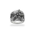 NAGPAL JEWELLERS men's silver ring with a detailed starfish design, size 19.
