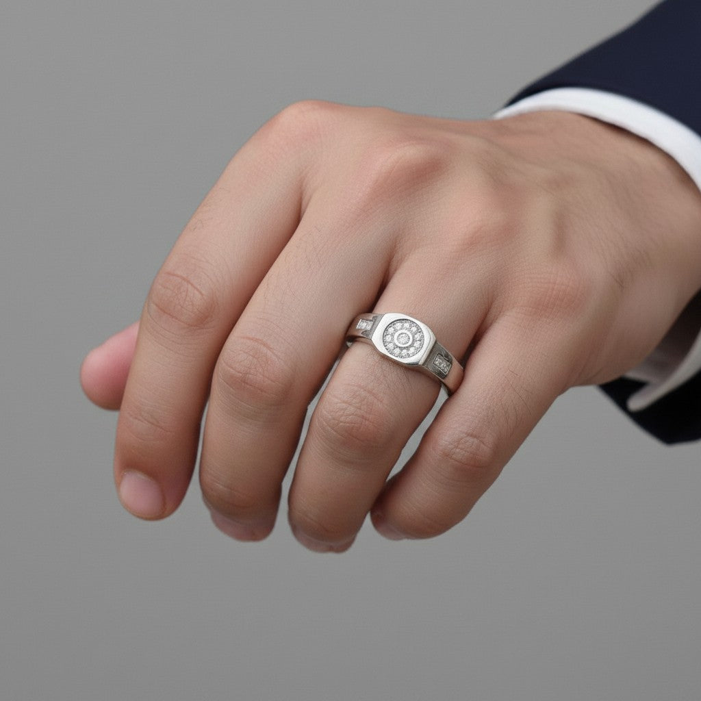 NAGPAL JEWELLERS The Sovereign men's ring, size 23, crafted from silver with a central circular diamond design and baguette accents.