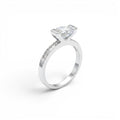 NAGPAL JEWELLERS Titan Glow ring with a large clear stone and small stones on the band, size 14.