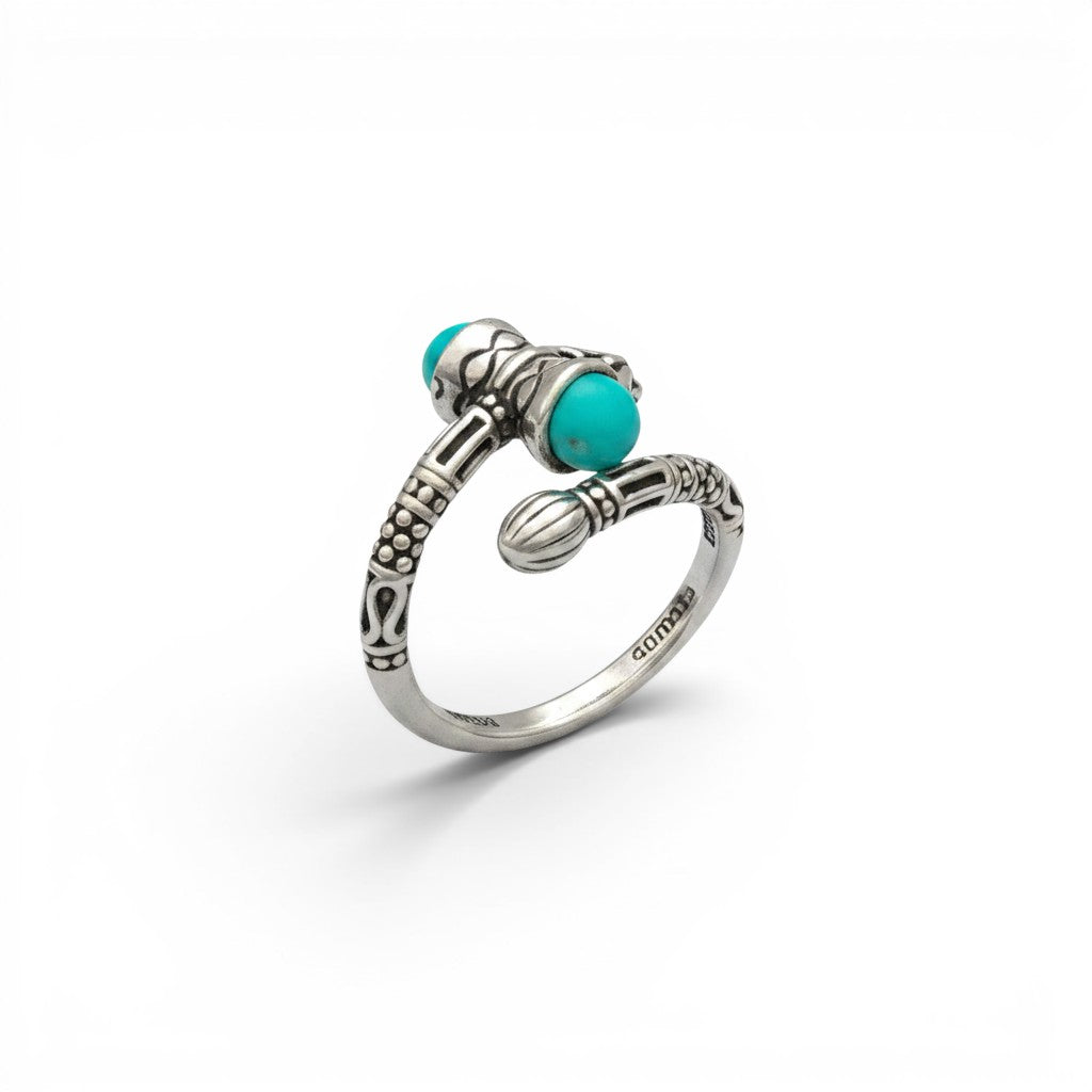 NAGPAL JEWELLERS silver Trishul Band ring with turquoise stones, size 18. Features intricate detailing and a unique design.