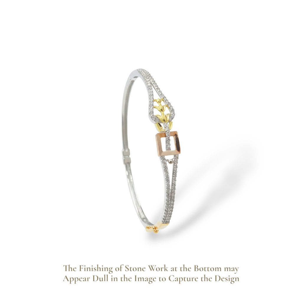 SILVAS AFA bangle bracelet in silver and gold tones featuring a delicate floral motif and a square buckle detail