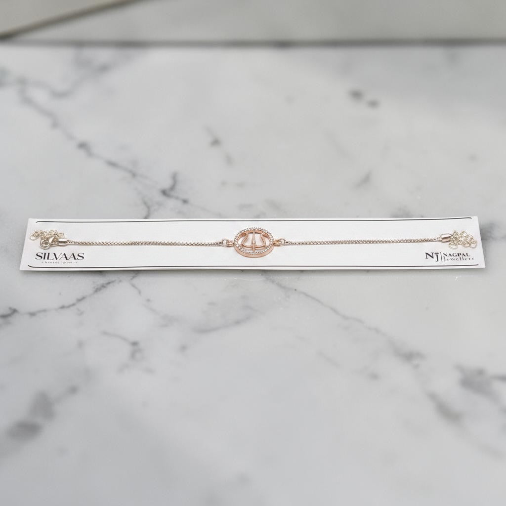 SILVAS rose gold tone sterling silver bracelet featuring a circular trident charm with delicate stone accents
