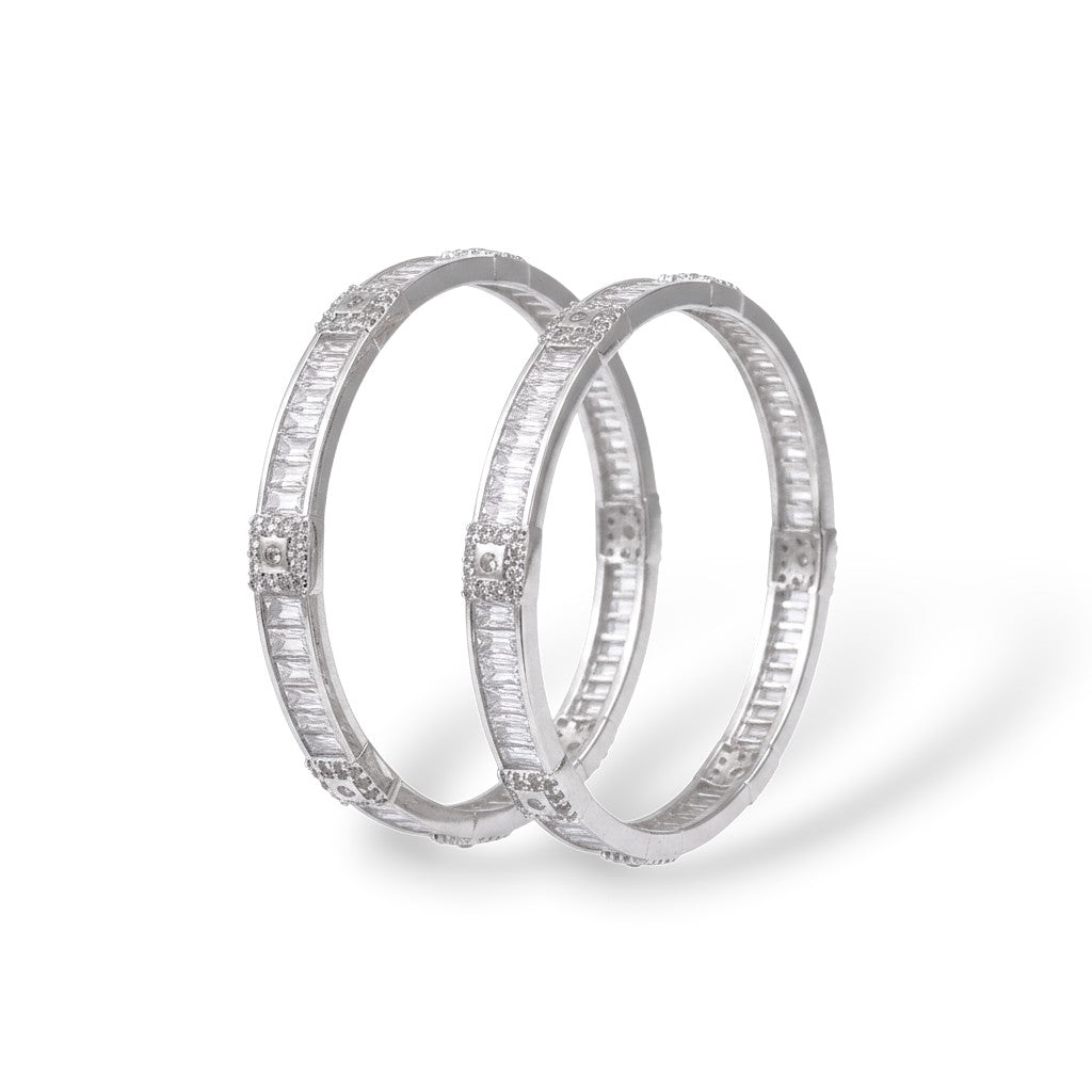 SILVAS pair of silver-tone bangles featuring baguette-cut cubic zirconia stones in a polished metal setting