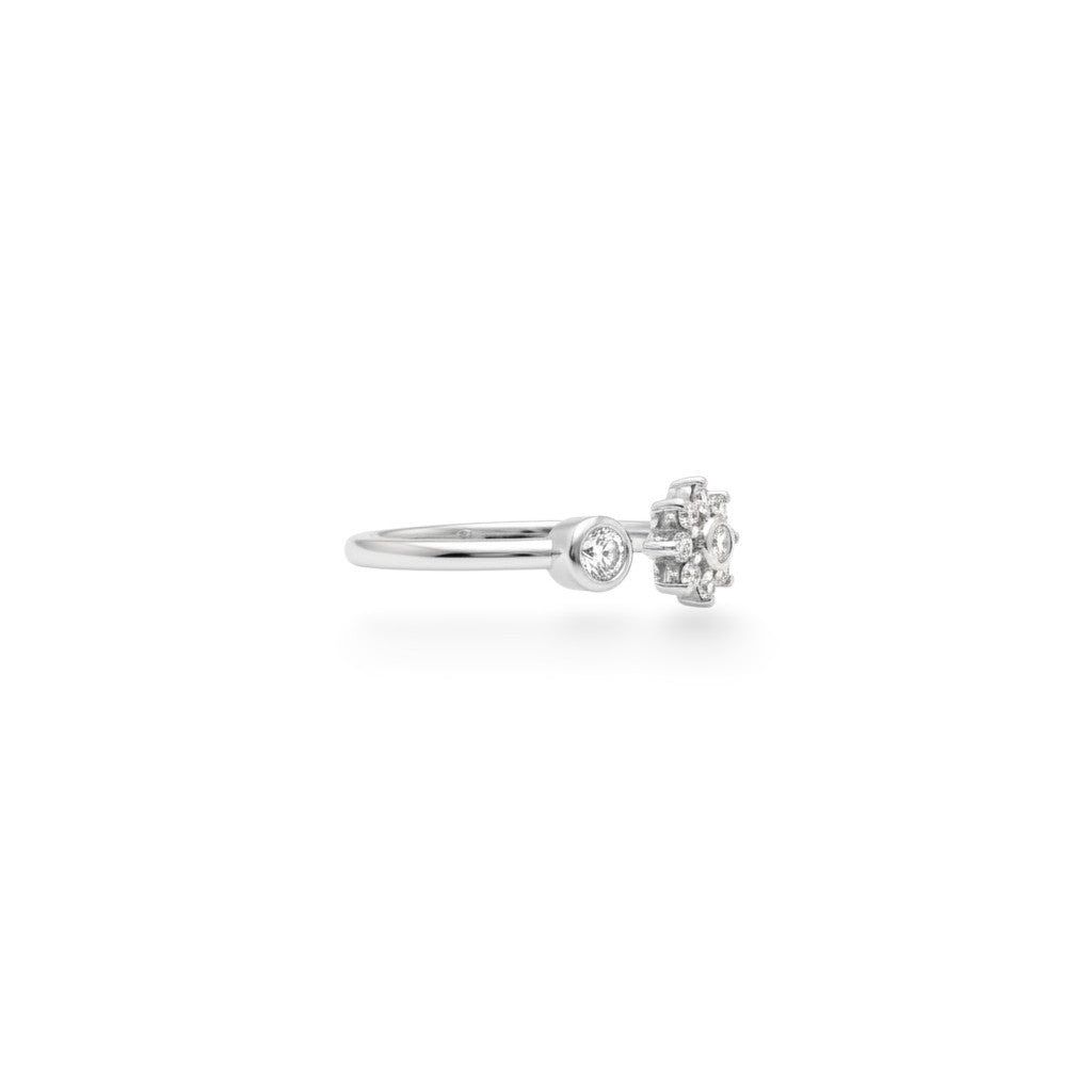 SILVAS silver open ring featuring a round solitaire diamond and a floral cluster setting on a polished band