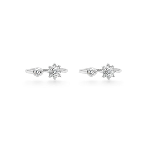 SILVAS open ring in silver featuring a round solitaire diamond and a floral diamond cluster accent
