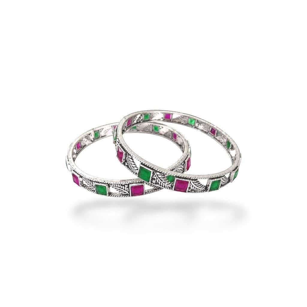 SILVAS silver bangles featuring alternating square green and pink gemstones with intricate leaf-patterned metalwork.