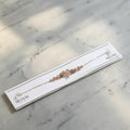SILVAS 92.5 sterling silver bracelet featuring a rose gold heart charm and decorative beads on a display card
